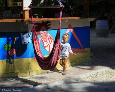 Street Photo - Young one at the outdoor pub.